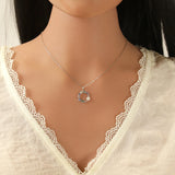 Pendentif jardin fleuri en argent + zirconiums + nacre