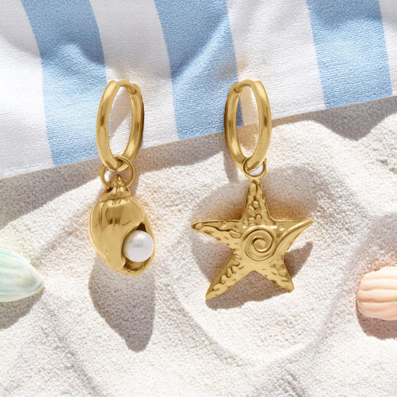 Boucles en acier doré coquillage + étoile de mer 880j1163
