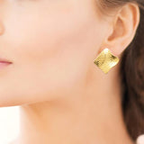 Boucles en acier doré 880j1093