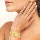Bracelet Jonc fleurs marguerite en acier doré 840j-1074