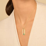 Collier en acier doré + cristal vert 850J1260