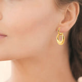 Boucles en acier doré 880j1045