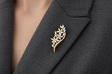 Broche en plaqué or et zirconiums 721-3