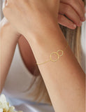 Bracelet deux anneaux en or jaune 9ct 440-27