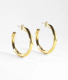 Boucles d'oreilles créoles ZAG Totie en acier doré
