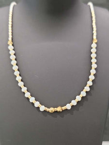 Collier en acier doré et pierres blanches 751-272