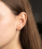 Boucles d'oreilles doubles ZAG Chi en acier doré (vendu à la pièce)
