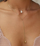 Collier ZAG Djima en acier doré avec perle